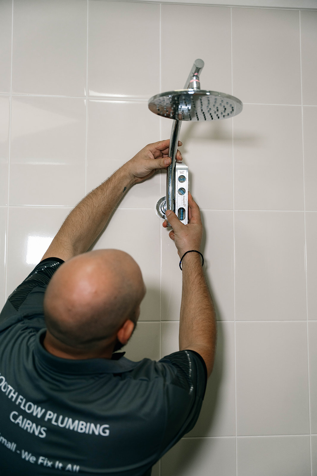 New shower rail being fitted