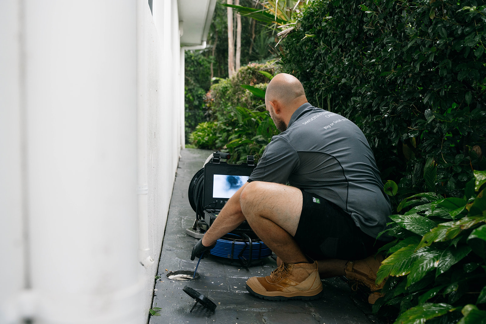 Drain camera inspection down the side of a Cairns home